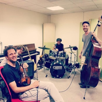 Rehearsing with Peter Ugrin (violin), Ratko Divjak (drums), Ilj Pušnik (bass), 2018 <em>Photo: Peter Ugrin s phone</em>